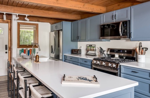 Moultonborough House | Beautiful new home sleeps 9 with perched sandy beach and steps into the water