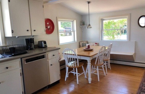 Raymond House | Beautifully landscaped home on Panther Pond just 20 feet from the shore!