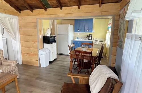Canadohta Lake Cottage | Bluebird Cottage: Cozy Rustic Lakefront Escape at The Pier, Perfect for 6!