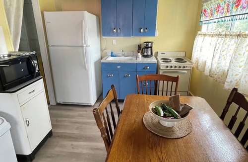 Canadohta Lake Cottage | Bluebird Cottage: Cozy Rustic Lakefront Escape at The Pier, Perfect for 6!