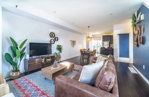 Mount Hope Huron Park Villa | ✦Boho-Chic Home: 4 BR + ❤ of City + Patio & BBQ