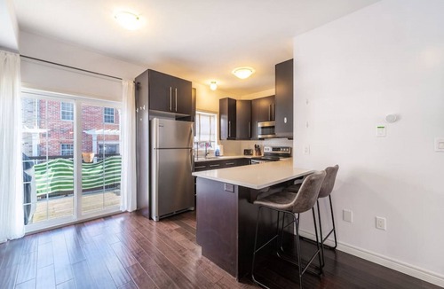 Mount Hope Huron Park Villa | ✦Boho-Chic Home: 4 BR + ❤ of City + Patio & BBQ
