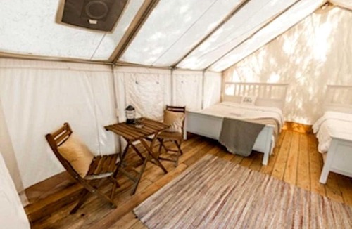 Broadalbin House | Boutique Queen Suite Glamping Tent with Two Queen Beds, Patio Dining, Grill, Pet Friendly in Broadalbin, New York