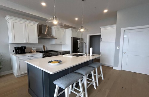 North Beach Haven Condo | Brand new Bayfront Luxury Townhome with Pool and Elevator.