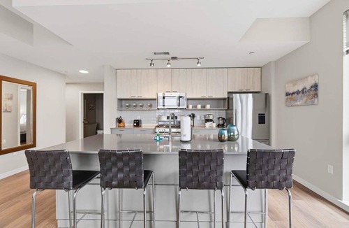Stamford Apartment | Bright Apt with Balcony