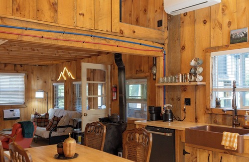 Hill Cabin | Cabin on a private lake + RV hookup. Surrounded by trails, lakes, and wildlife
