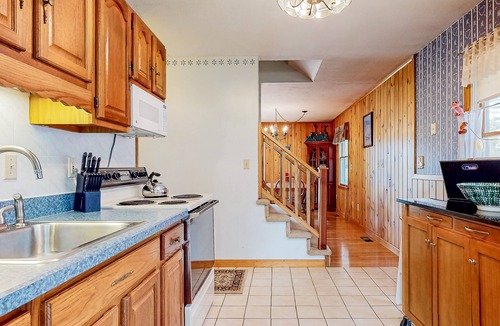East Wakefield House | Calming dog-friendly lake view home with firepit, wood stove, patio, & gas grill