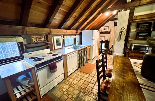 Jay Cabin | Camp Creaky Birch, cozy 2-bedroom cabin with privacy, firepit and deck.