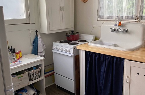 Seneca Falls Cottage | Cayuga Lake Charming Vintage Cottage on the Water with Private Dock