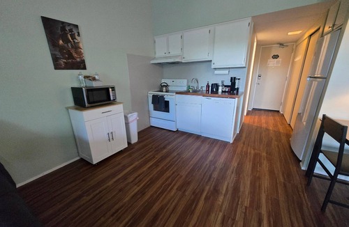 Weirs Beach Apartment | Cedar Lodge Condo Balcony and Full Kitchen
