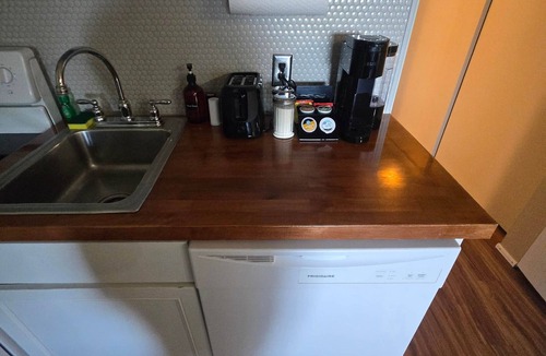 Weirs Beach Apartment | Cedar Lodge Condo Balcony and Full Kitchen