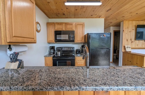 Woodstock Condo | Chalet-styled condo in the heart of the White Mountains; pool/hottub/golfing