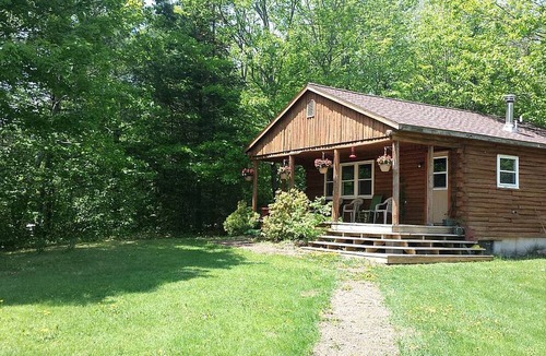 Exeter Cabin | Charming Cabin Rental with Private Front Deck near Bangor, Maine