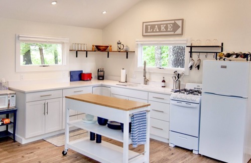 Alton Bay Cottage | Charming cottage with beach access, a grill, dock, & nearby golf