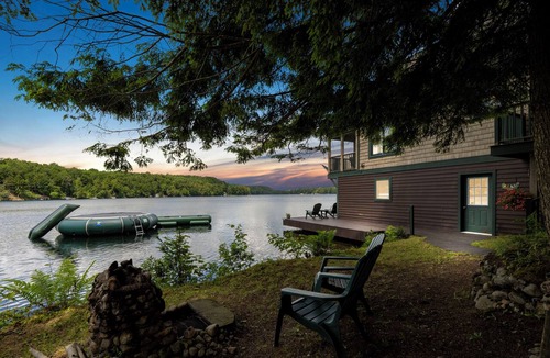 Woodgate House | Charming Lakeside Little Evergreen Cottage on White Lake
