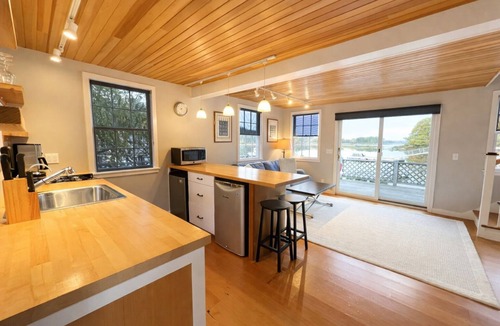 Sebascodegan Island Cottage | Charming Maine cottage overlooking the working waterfront.