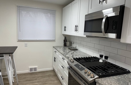 Mentor House | Charming Mentor Bungalow with Great Central Location and Fenced In Yard