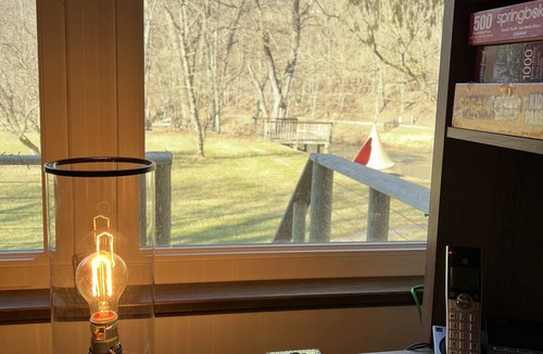Valley Bend House | Charming, remodeled farmhouse on the river to kayak with a hot tub & a firepit!