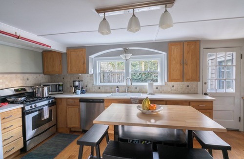Commercial Street House | Charming West End home with brand new bathrooms and secluded patio