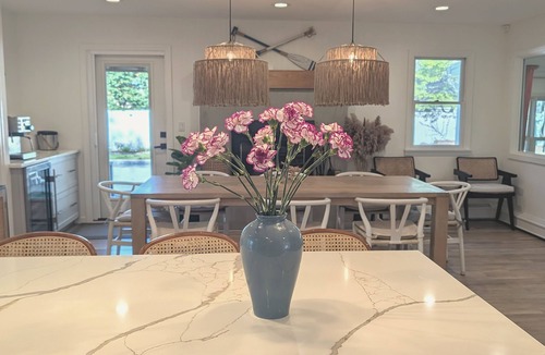 Brookhaven House | Chic Retreat: Hot Tub, Heated Pool, Sunroom