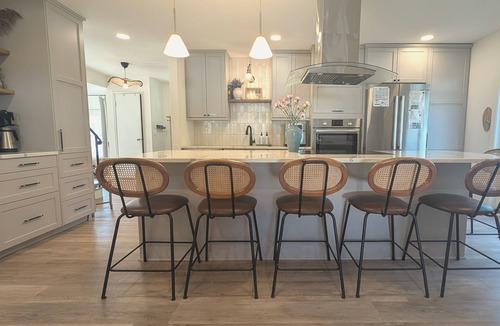 Brookhaven House | Chic Retreat: Hot Tub, Heated Pool, Sunroom