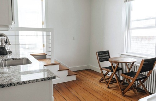 Yachting Village Apartment | CHIC Thames Str. Deck Harbor Views free parking