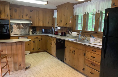 Wolfeboro House | Classic Lake House with Guest Cottage on Wolfeboro's Premier Springfield Point