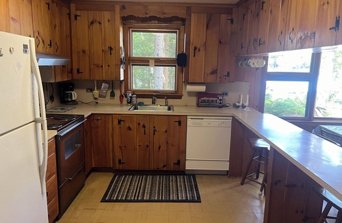 Wolfeboro House | Classic Lake House with Guest Cottage on Wolfeboro's Premier Springfield Point