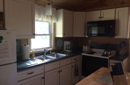 Oxford Cabin | Classic Maine Lakefront Cabin, Porch and Canoe