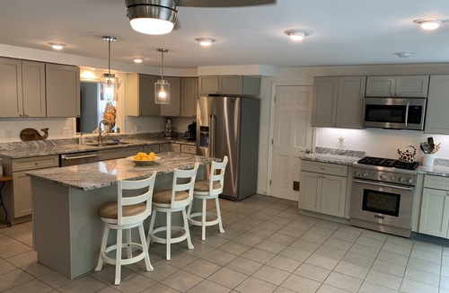 Kennebunk House | Coastal Retreat-Heated Saltwater Pool, Hot Tub & Sauna, 1 mile walk to the Ocean