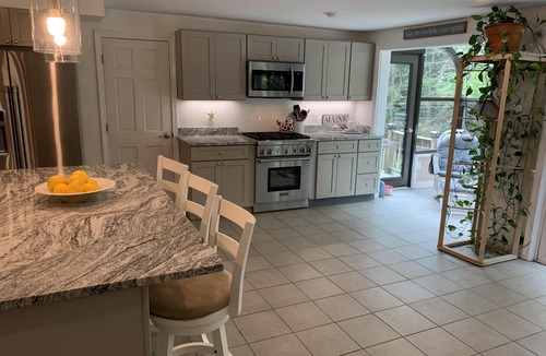 Kennebunk House | Coastal Retreat-Heated Saltwater Pool, Hot Tub & Sauna, 1 mile walk to the Ocean