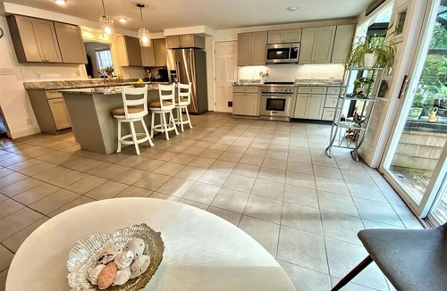 Kennebunk House | Coastal Retreat-Heated Saltwater Pool, Hot Tub & Sauna, 1 mile walk to the Ocean