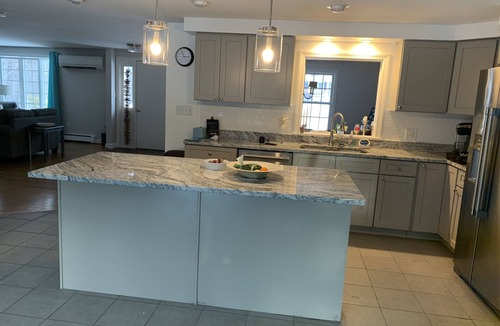 Kennebunk House | Coastal Retreat-Heated Saltwater Pool, Hot Tub & Sauna, 1 mile walk to the Ocean