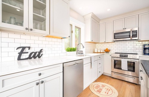 North Conway Villa | Colorful Oasis: Modern, Water View, Family-Friendly