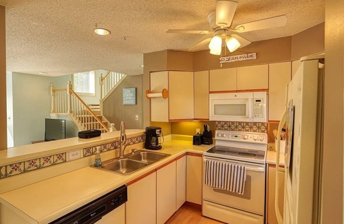 Ocean Park Condo | Come relax on the deck and soak on the ocean breeze or enjoy all that Ocean Park Meadows offers!