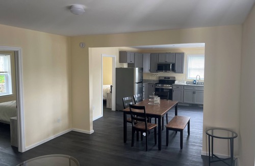 Guild Apartment | Cozy 2-bedroom apt-1 in Lakes Region with AC, WiFi, Pet friendly 2 queen beds