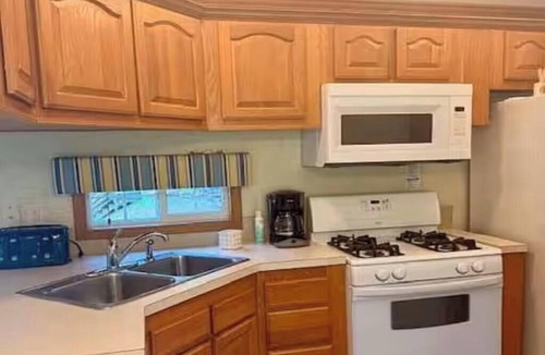 East Falmouth Cabin | Cozy 2-bedroom cabin with AC. Fun for all ages with pond and pool access.