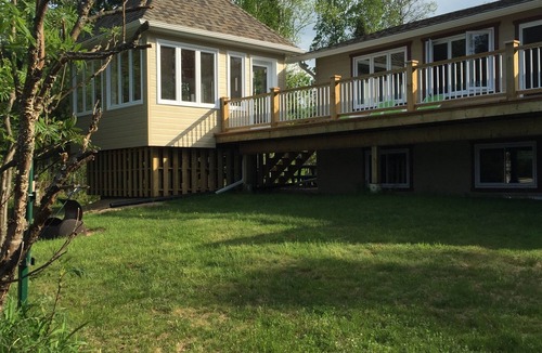 Cayamant Ski Chalet | Cozy cottage on a beautiful shallow sand beach at Patterson lake!