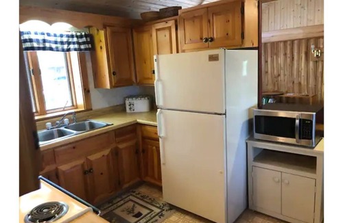 Millinocket Cottage | Cozy, Lakefront Cottage, 9 miles to Baxter, dock, kayaks, canoe, 2 bedroom