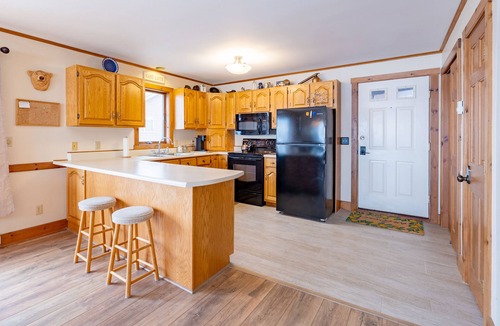 Newport Center Apartment | Cozy Lakeside Condo with Heated Pool!
