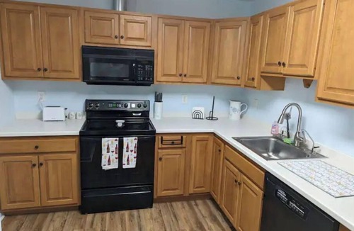 Andover Condo | Cozy Rustic 2BR Retreat Near Park and Lakes