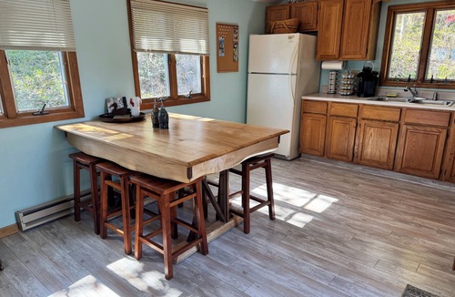 Sodus Point Cottage | Cute red cottage on the hillside overlooking Sodus Bay. Direct water access