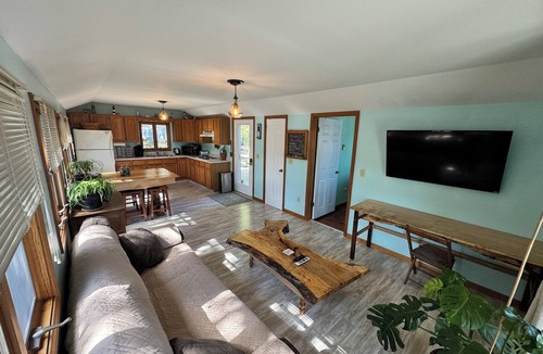 Sodus Point Cottage | Cute red cottage on the hillside overlooking Sodus Bay. Direct water access