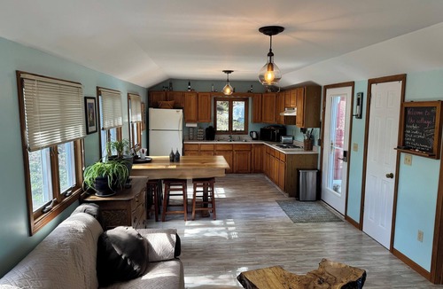 Sodus Point Cottage | Cute red cottage on the hillside overlooking Sodus Bay. Direct water access