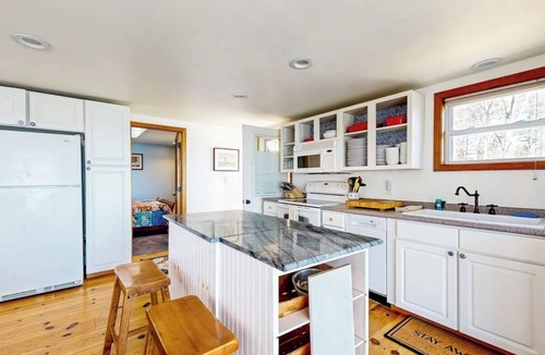 East Boothbay House | Damariscotta Vistas Dog-friendly river-view home w/wood stove, deck, patio, dock, beach, grill