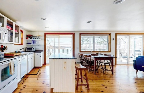 East Boothbay House | Damariscotta Vistas Dog-friendly river-view home w/wood stove, deck, patio, dock, beach, grill
