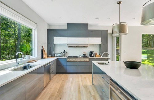 North Sea House | Designer Gut Renovated Farmhouse on over 1 Acre, Numerous Spacious Living.