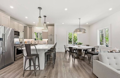 Cataumet House | Designer Home with Wraparound Porches & Fire Pit