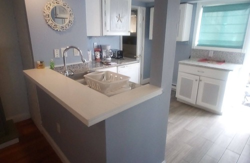 Hull Condo | Direct ocean view 2 bed 2 bath 36 ft deck walk to beach.