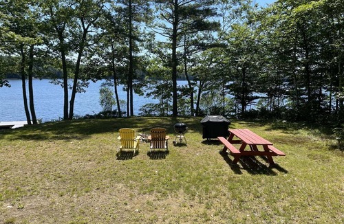 Nobleboro Cabin | Discover Lazy Acres in Nobleboro: a cozy 2-bedroom retreat by the water.